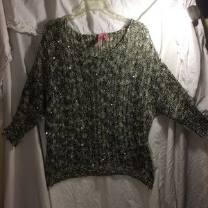 206.  Dolled Up Sweater by FANG. Size M